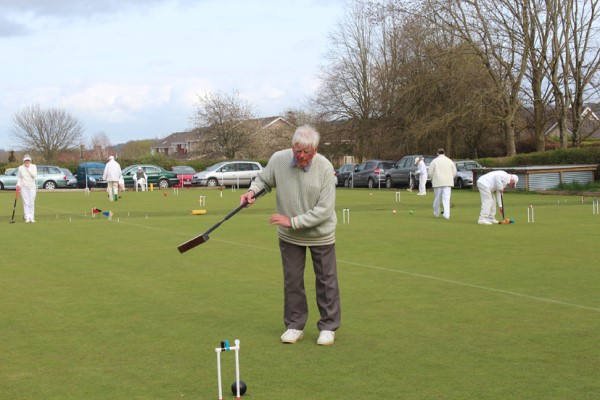 Ron George(C) willing the black to go through hoop 2